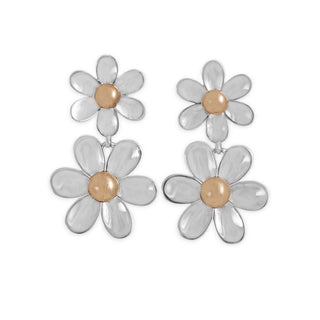 Flower-shaped earrings with silver petals and gold centers on a white background