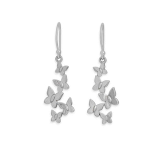 Silver butterfly earrings on a white background