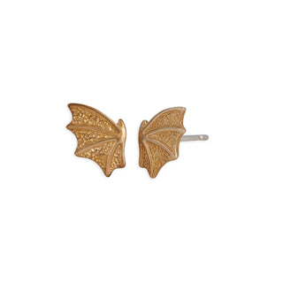 Gold bat wing earrings on a white background