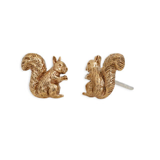 A pair of bronze squirrel stud earrings, one shown from the front and the other from the side displaying the post, on a plain white background.