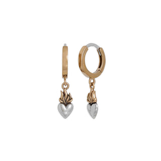 Bronze and silver huggie hoop earrings with heart-shaped charms on a white background