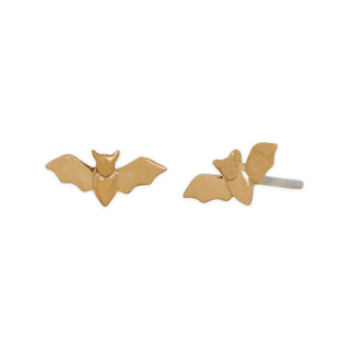 Gold bat-shaped earrings on a white background