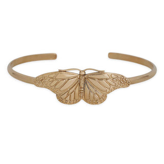 Bronze butterfly-themed bangle on a white background