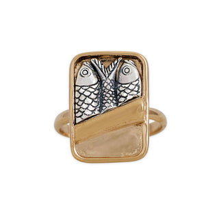 A gold and silver ring featuring a rectangular face with two stylized fish designs and a diagonal gold bar, shown on a plain white background.