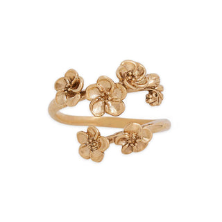 Bronze floral ring on a white background
