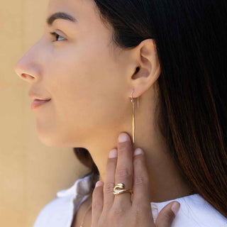 Long Pod Dangle Earrings on model