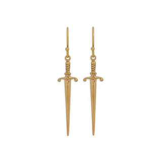 Gold sword-shaped earrings on a white background