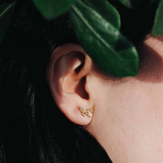 Bronze Butterfly Earrings on Ear