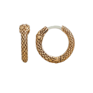 A pair of gold hoop earrings featuring a detailed snake skin scale pattern, shown on a plain white background.