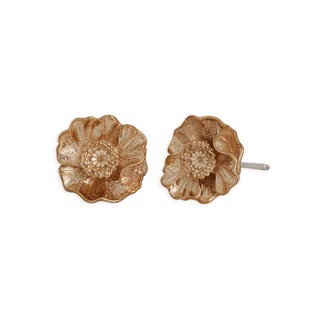 Pair of gold floral earrings on a white background